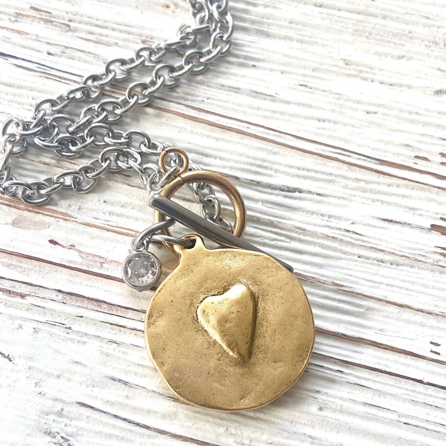 Hand Casted Mixed Metal Cross & Heart Coin Charm on Stainless Steel Toggle Necklace with CZ Accent